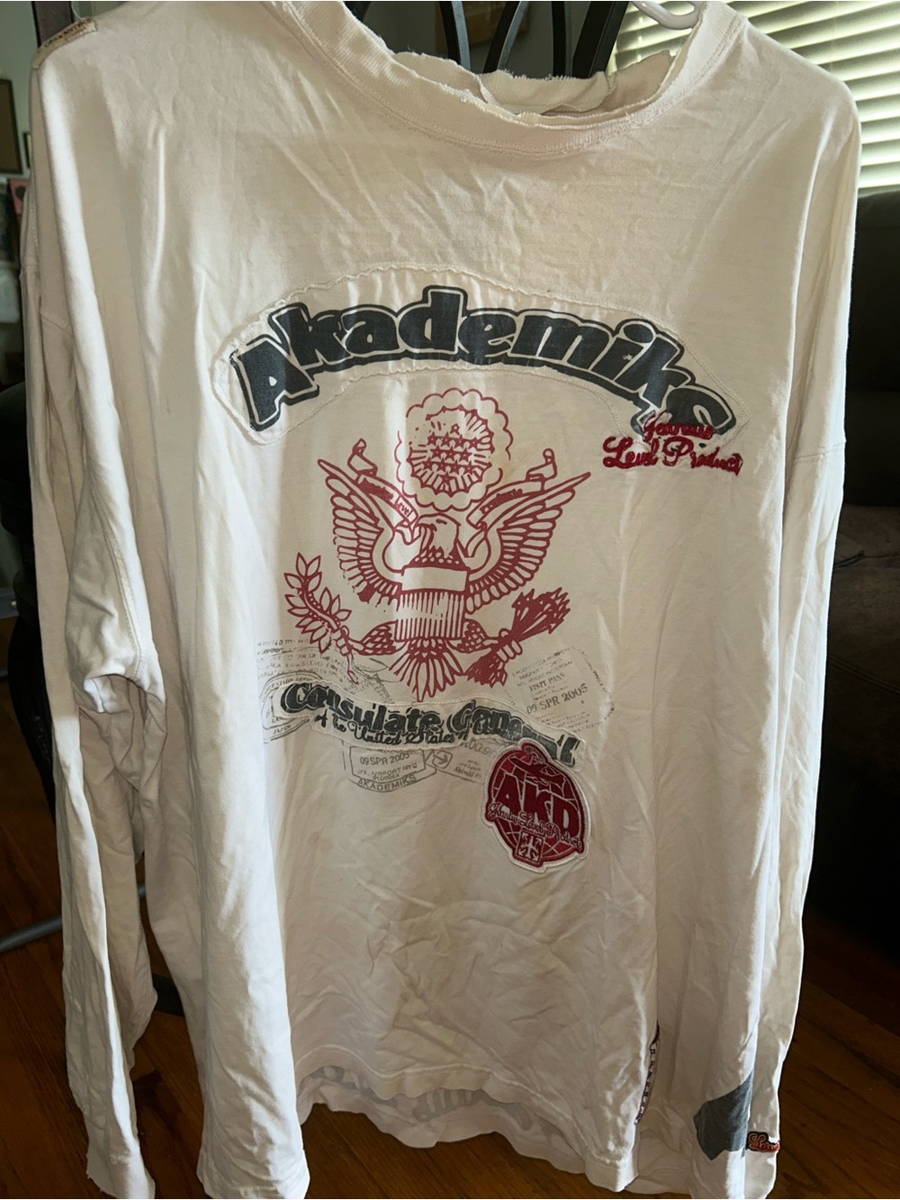 Akademiks White Long-Sleeve Graphic Tee with Red and Black Logos